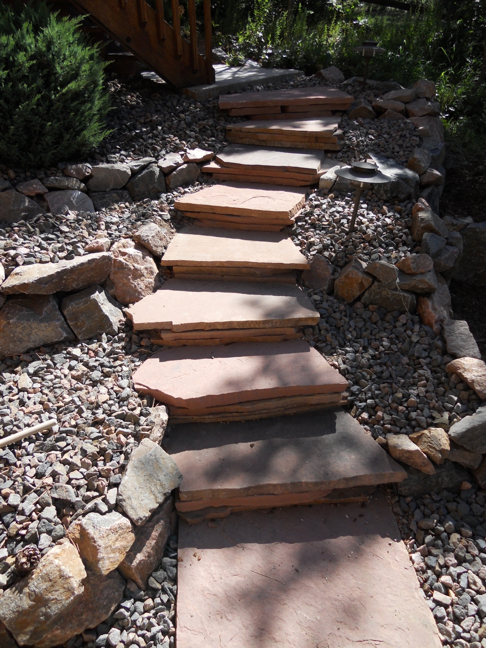 Red Flagstone Pathway Stairs with Tiered Retaining Walls
