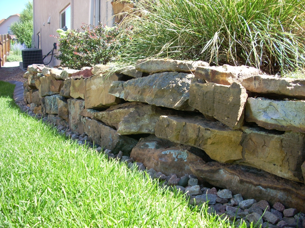 Rock Retaining Wall with Grass