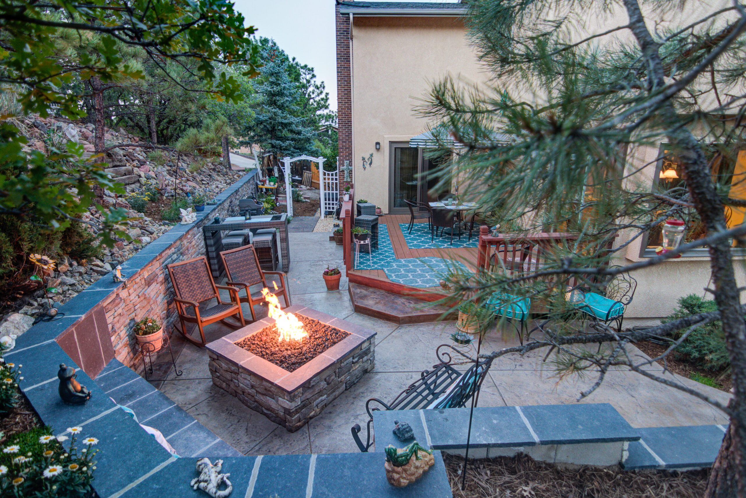 Backyard Bliss: Deck Installation with Built-In Seating and Fire Pit
